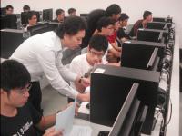 Prof. Ong Yew Soon's group assisting students in game development